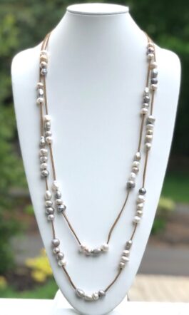 “GROUPED PEARLS”, SUEDE LEATHER, FRESHWATER PEARLS