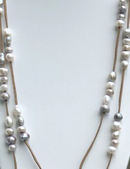 “GROUPED PEARLS”, SUEDE LEATHER, FRESHWATER PEARLS