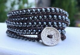 WRAP BRACELET, HEMATITE STONES, HAMMERED ZINC BUTTON