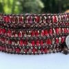 wrap, hammered button, adjustable, designer inspired, , takes 2-4 hours to make, handcrafted, red, faceted, crystals, mottled