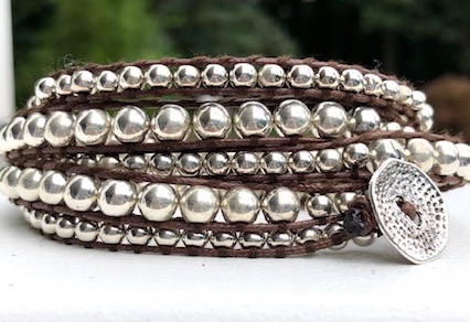 wrap, wraps around wrist, zinc, silver, brown, hammered button, adjustable, handcrafted, takes 2-4 hours to make, waxed cord, designer inspired