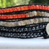 wrap, wraps around wrist, hematite, labradorite, black, orange, hammered button, adjustable, handcrafted, takes 2-4 hours to make, semiprecious stone, waxed cord, designer inspired, sport colors