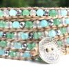 wrap, wraps around wrist, green, blue, silver, zinc, hammered button, adjustable, handcrafted, takes 2-4 hours to make, semiprecious stone, waxed cord. spring, summer