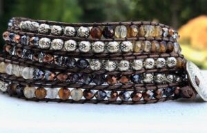 wrap, wraps around wrist, brown, zinc, hammered button. agate, adjustable, handcrafted, takes 2-4 hours to make, semiprecious stones, semiprecious stones