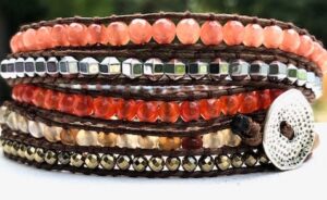 wrap, wraps around wrist, orange, zinc, hammered button. agate, adjustable, handcrafted, takes 2-4 hours to make, semiprecious stones
